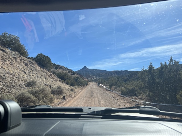 Forest road with Cerro Pedernal in the distance